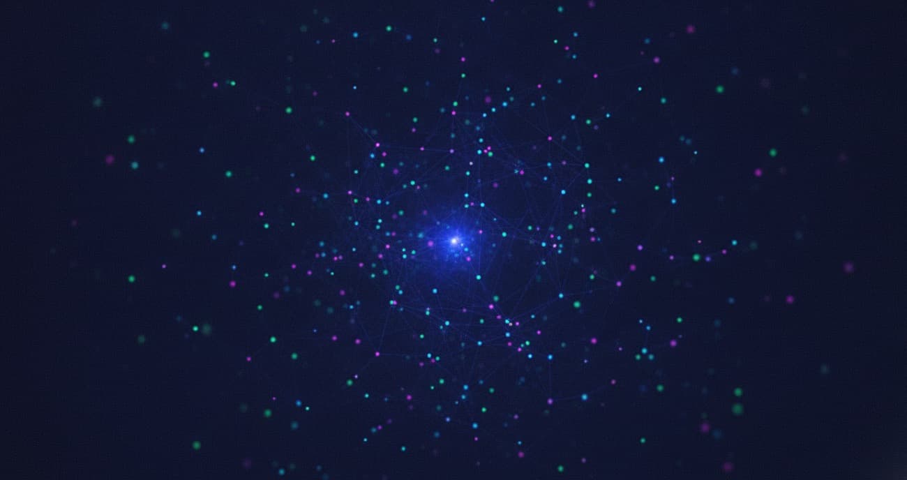 Abstract network of glowing nodes in the four engine colours converging on an indigo core